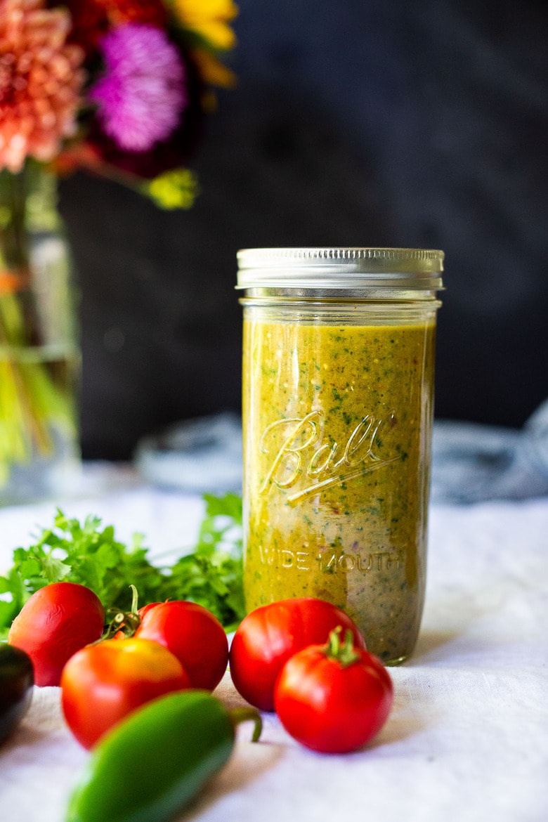 How to make homemade Enchilada Sauce (both red and green) by roasting the tomatoes or tomatillos before blending. Not only does this give great flavor, it is all made on one sheet-pan! Simple and EASY! #enchiladasauce 