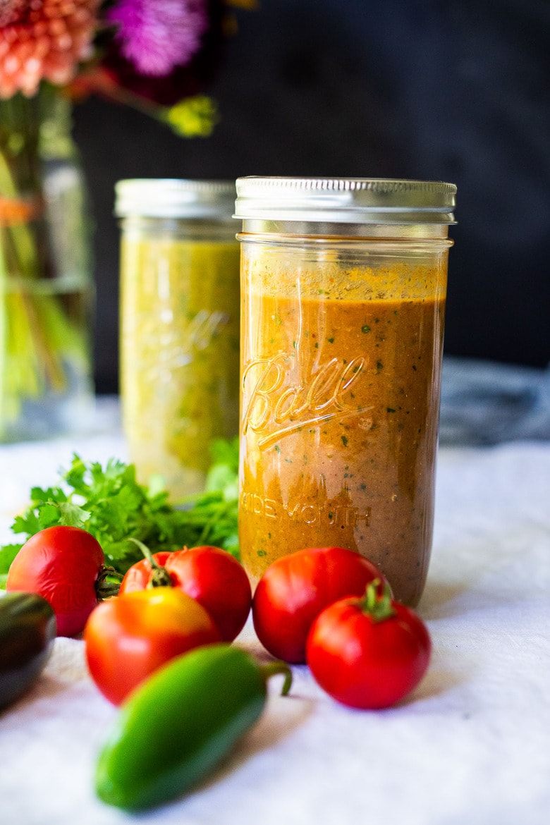 How to make homemade Enchilada Sauce (both red and green) by roasting the tomatoes or tomatillos before blending. Not only does this give great flavor, it is all made on one sheet-pan! Simple and EASY! #enchiladasauce 