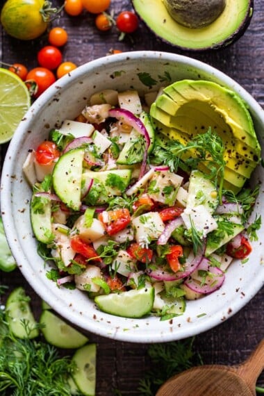 This vegan, plant-based Ceviche will transport you to Mexico. Made with hearts of palm and avocado, this easy recipe can be served on tostadas, with chips or in lettuce cups! #veganceviche #heartsofpalm #veganmexican #ceviche