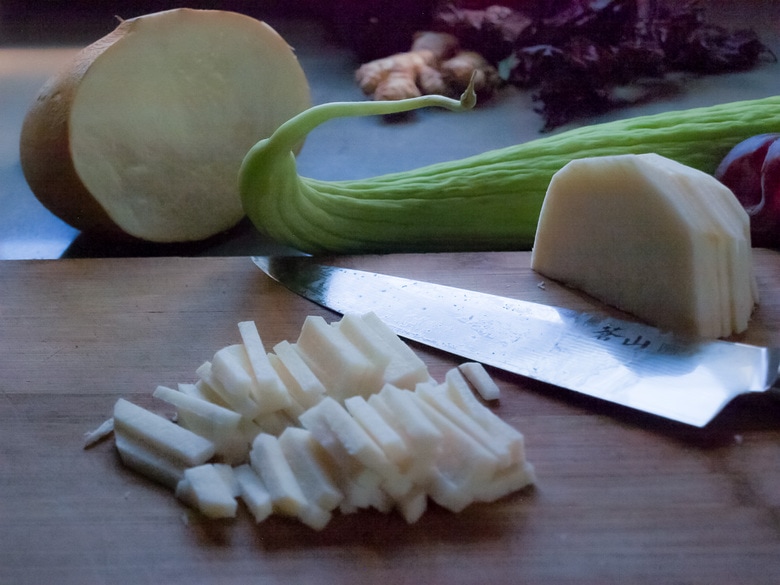 plum salad ingredients- jicama being chopped 