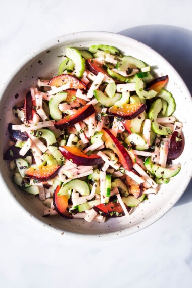 This Plum Salad with Jicama and Cucumber is dressed with a flavorful Plum Shiso Shrub. Crunchy, refreshing and light it's deliciously cooling on and hot summer's day! Vegan and GF.