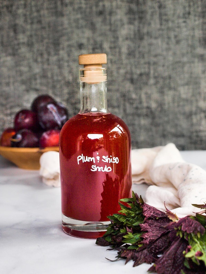 How to make a shrub, a flavorful, fruit-infused drinking vinegar used in cocktails, mocktails, vinaigrettes and sauces! This makes for a beautiful hostess gift! 