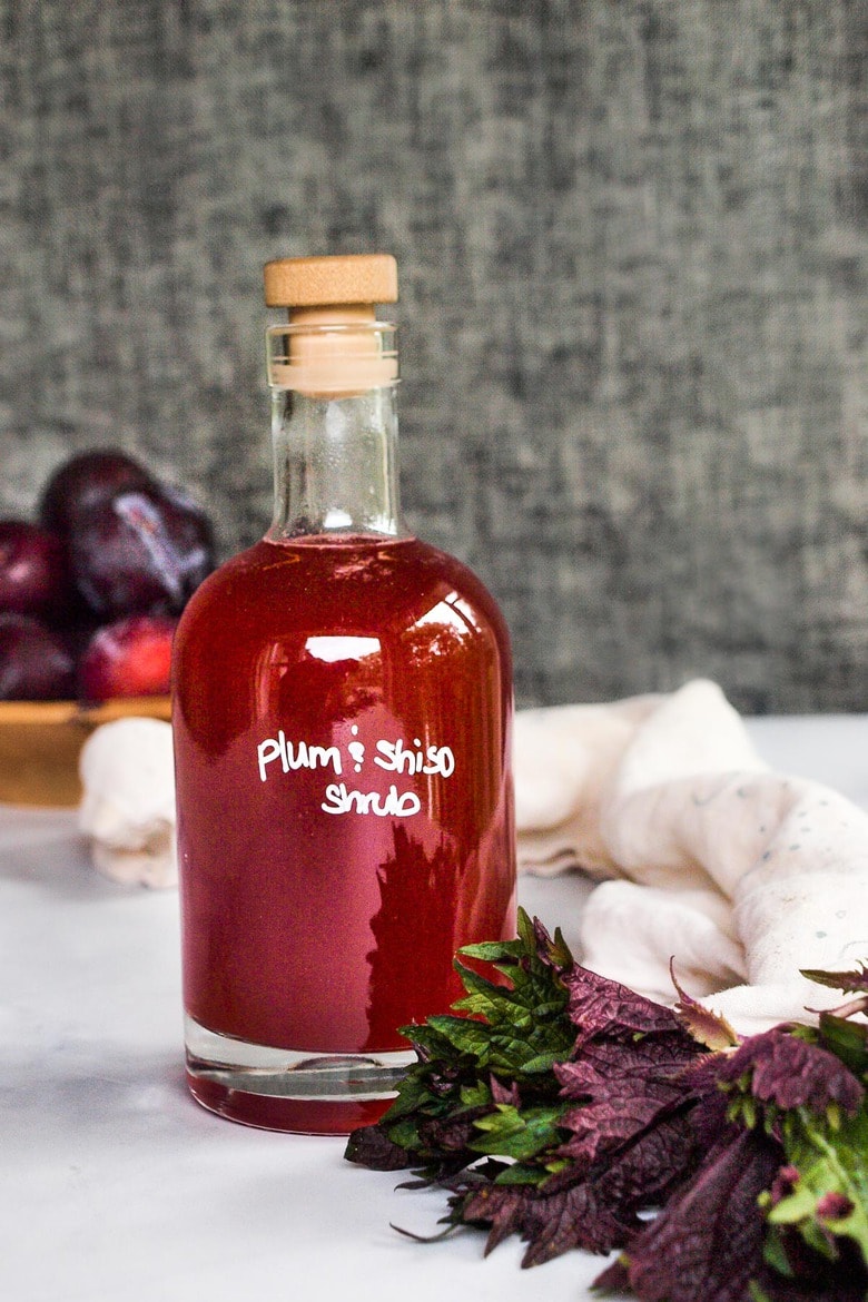 How to make a shrub, a flavorful, fruit-infused drinking vinegar used in cocktails, mocktails, vinaigrettes and sauces! This makes for a beautiful hostess gift! 