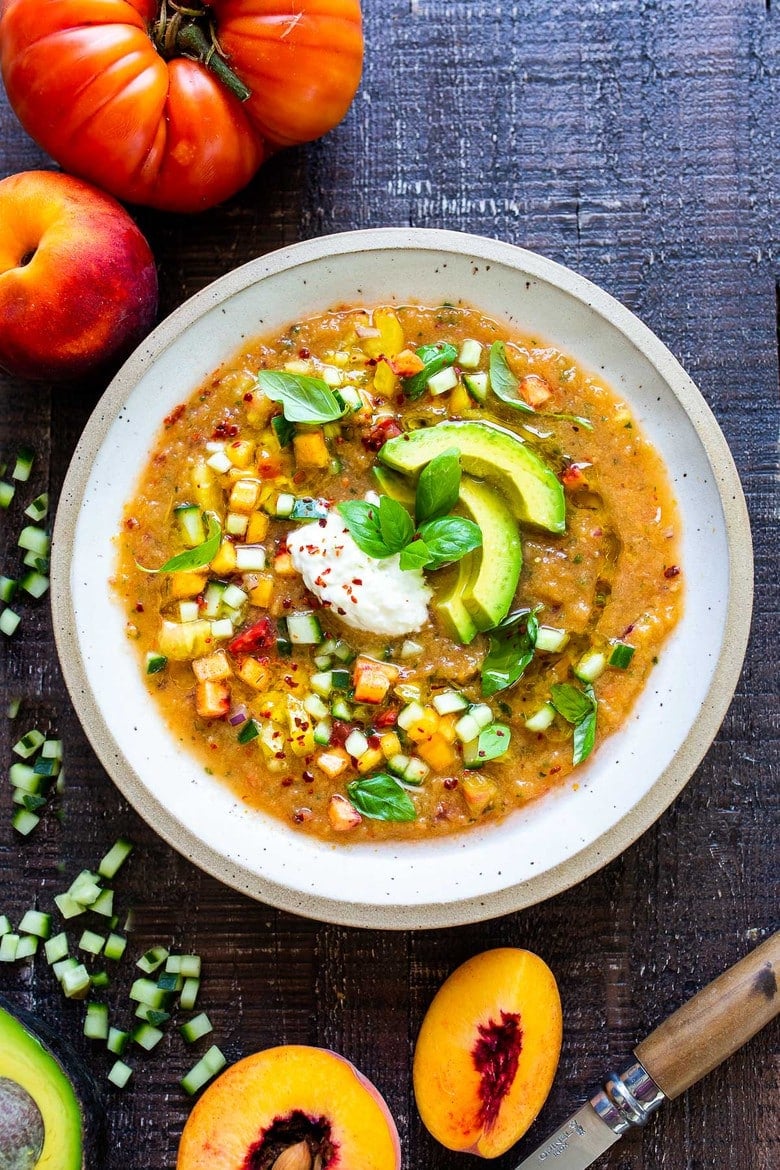 Tomato Peach Gazpacho with Basil and Burrata -a chilled summer soup that is cooling and refreshing and easy to whip up. Vegan-adaptable! #gazpacho #peachrecipes #tomatorecipes #summerrecipes #chilledsoup