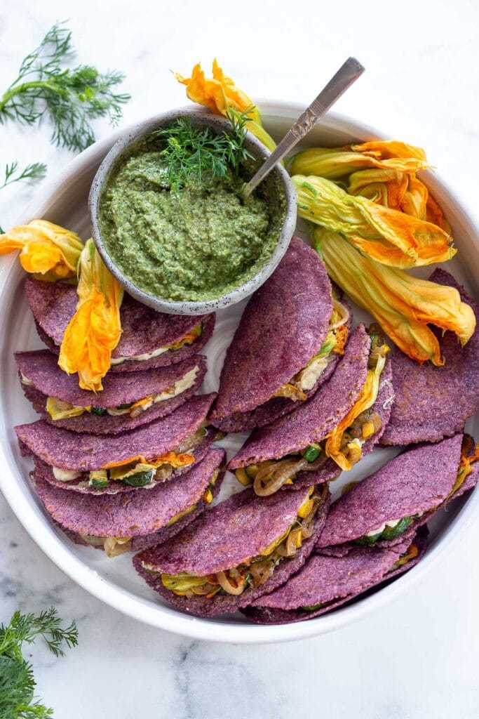 A tasty recipe for Zucchini Quesadillas with creamy cashew cheese and Poblano Pumpkin Seed Salsa. Vegan and delicious! #vegan #quesadillas #zucchini #zucchinirecipes