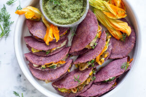 A tasty recipe for Zucchini Quesadillas with creamy cashew cheese and Poblano Pumpkin Seed Salsa. Vegan and delicious! #vegan #quesadillas #zucchini #zucchinirecipes