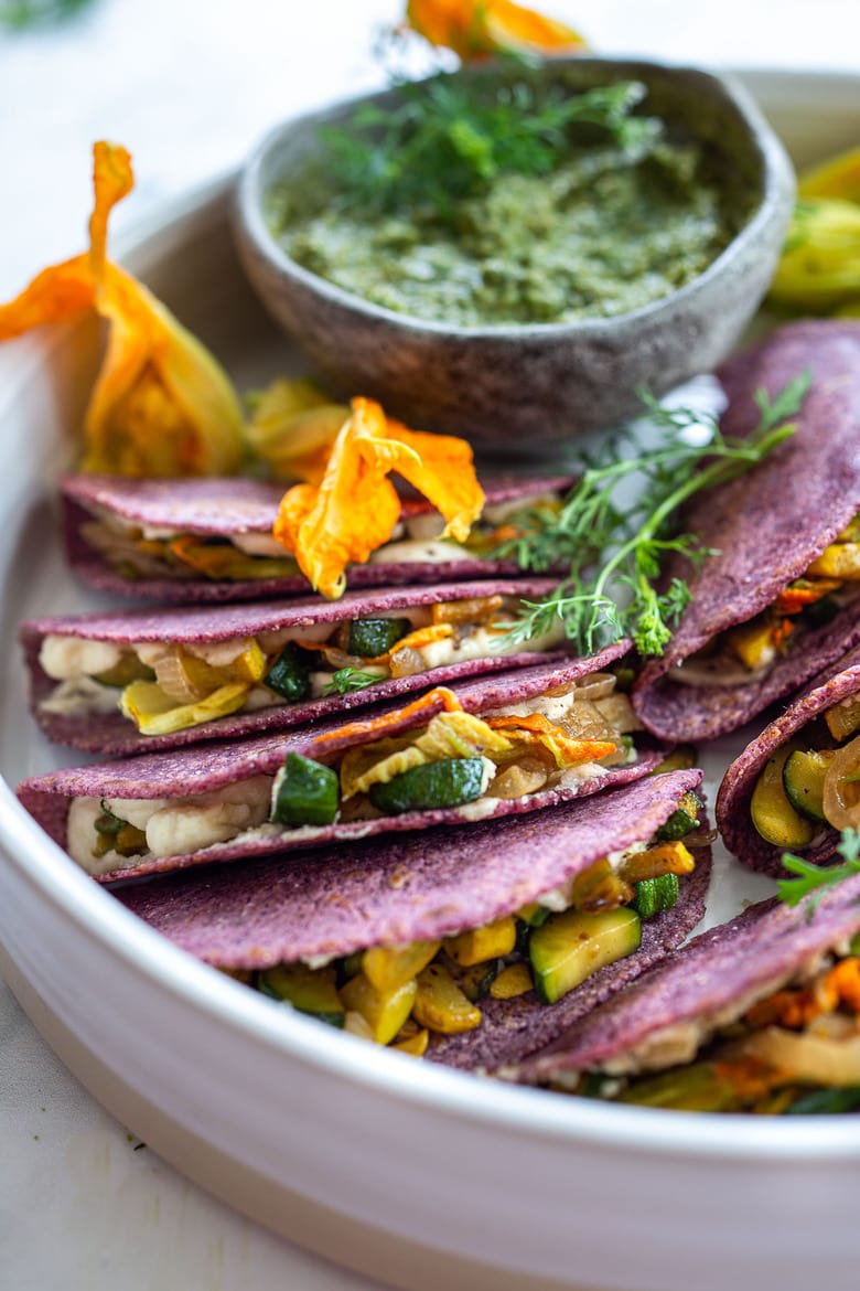 These flavorful Zucchini Quesadillas are made vegan with cashew cheese and served up with a flavorful Poblano Salsa. #quesadillas #vegan #plantbased #wfpb