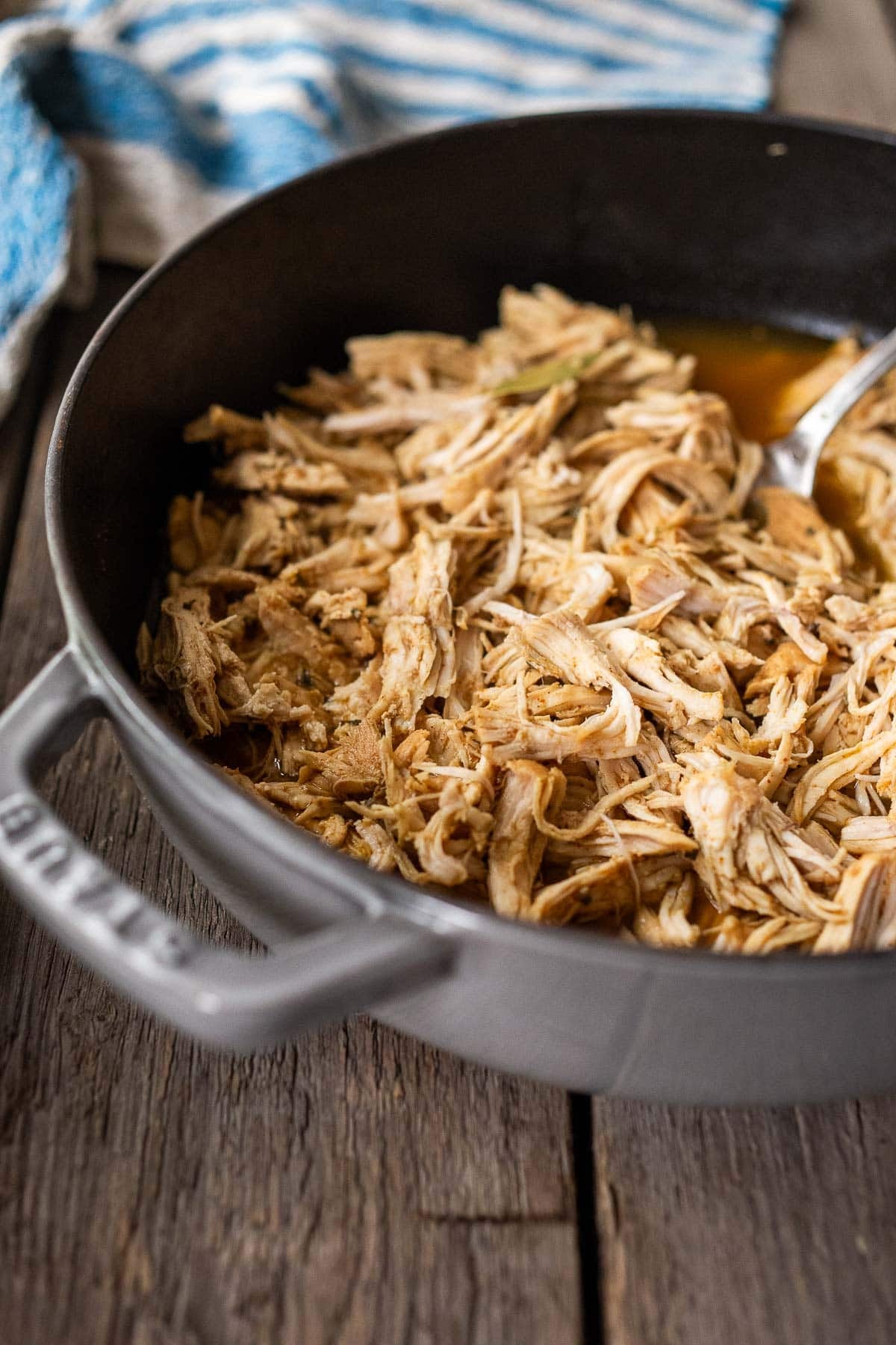 shredded chicken breast in the cooking liquid.