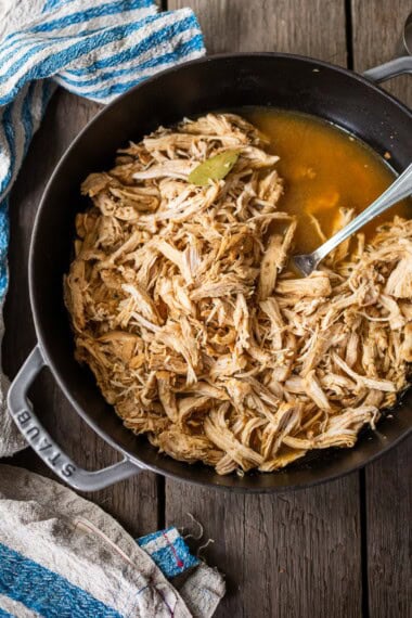 This foolproof Shredded Chicken recipe is juicy, tender, and full of flavor-an easy meal-prep staple for tacos, enchiladas, burrito bowls, sandwiches, and more. Includes stovetop, Instant Pot, and Slow Cooker methods!
