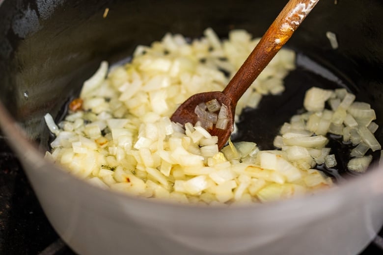 Sautéing onion for tomato soup.