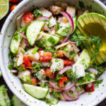 This vegan, plant-based Ceviche will transport you to Mexico. Made with hearts of palm and avocado, this easy recipe can be served on tostadas, with chips or in lettuce cups! #veganceviche #heartsofpalm #veganmexican #ceviche