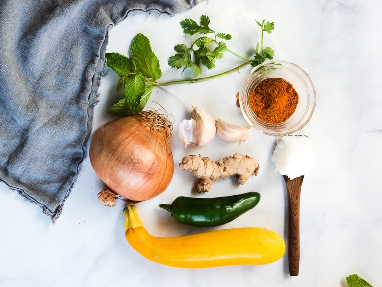 Curried Zucchini Soup with ginger and mint. A fast and easy vegan-adaptable soup that is healthy and flavorful.