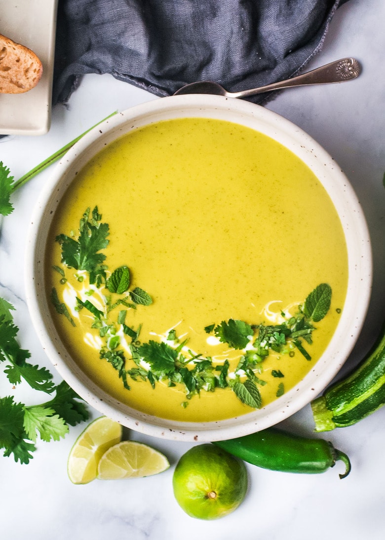 Curried Zucchini Soup with ginger and mint. A fast and easy vegan-adaptable soup that is healthy and flavorful. #zucchini #curriedzucchinisoup