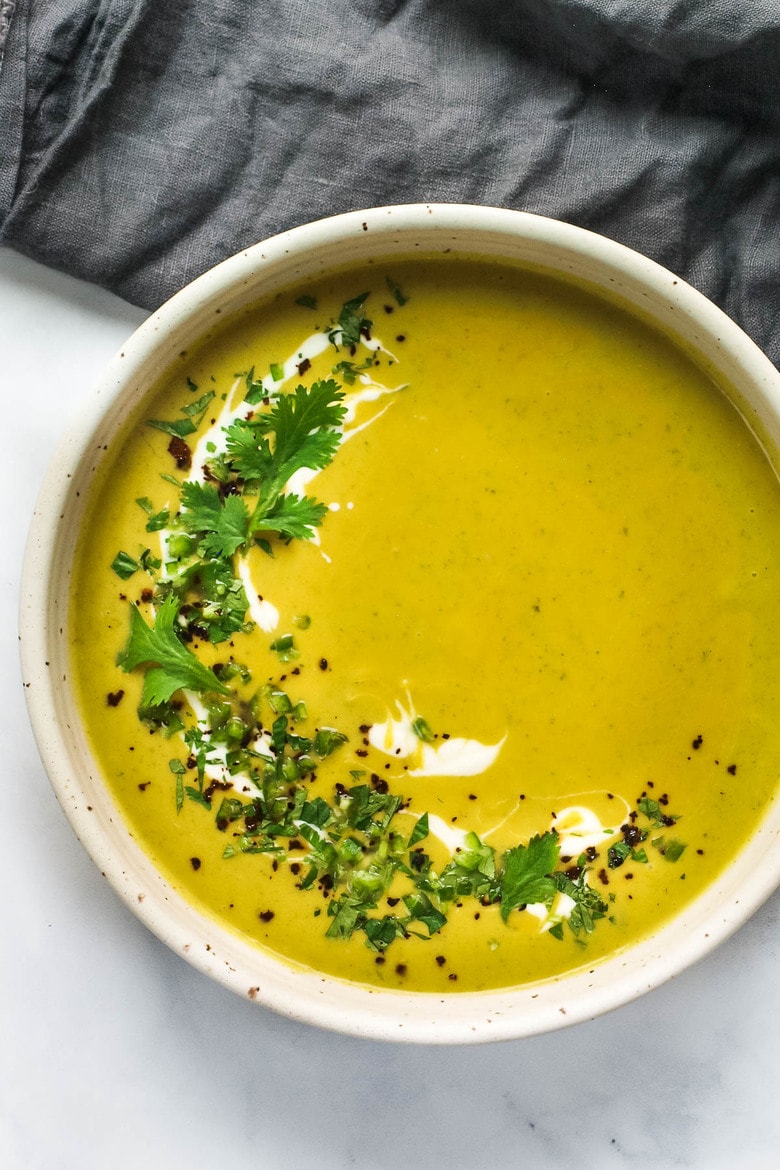 Curried Zucchini Soup with ginger and mint. A fast and easy vegan-adaptable soup that is healthy and flavorful.