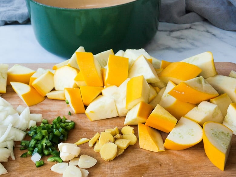 Curried Zucchini Soup with ginger and mint. A fast and easy vegan-adaptable soup that is healthy and flavorful.