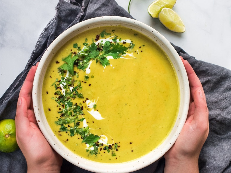 Curried Zucchini Soup with ginger and mint. A fast and easy vegan-adaptable soup that is healthy and flavorful.