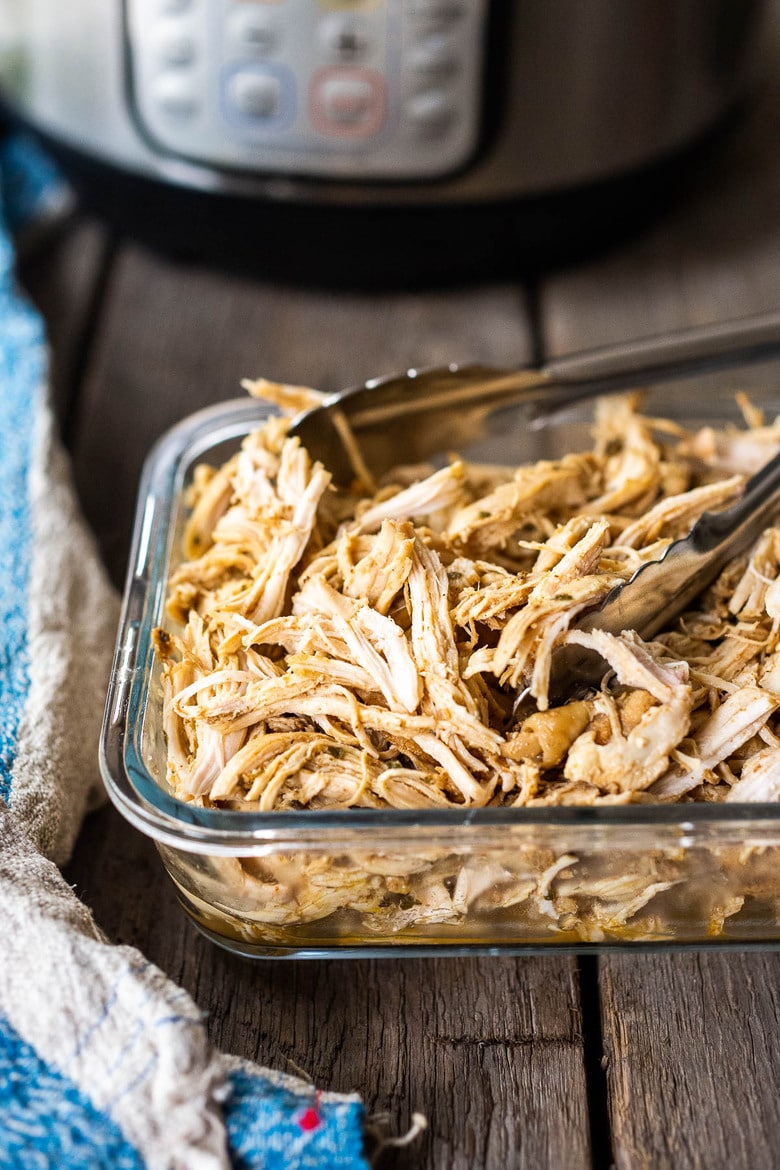 A simple easy recipe for Shredded chicken that can be made in an Instant Pot, Slow Cooker or on the Stovetop. Use breasts or thighs, fresh or frozen, great for meal prep and busy weeknight dinners. Keeps for 5 days in the fridge, or freeze! #shreddedchicken 