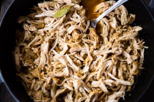 A simple easy recipe for Shredded chicken that can be made in an Instant Pot, Slow Cooker, or on the Stovetop. Use breasts or thighs, fresh or frozen, great for meal prep and busy weeknight dinners. Keeps for 5 days in the fridge, or freeze! #shreddedchicken