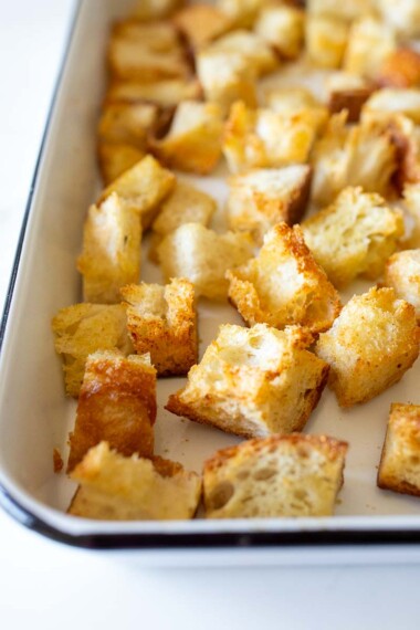 These Sourdough Croutons are so easy and delicious! They're the perfect way to use up leftover sourdough bread! They keep up to 2 weeks are the perfect addition to soups and salads. Vegan.