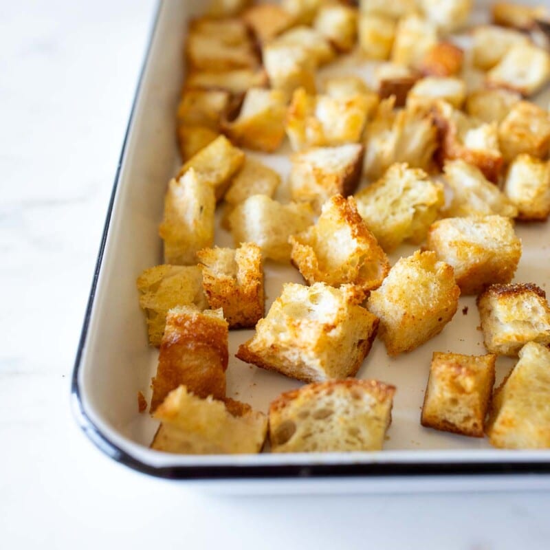 These Sourdough Croutons are so easy and delicious! They're the perfect way to use up leftover sourdough bread! They keep up to 2 weeks are the perfect addition to soups and salads. Vegan.
