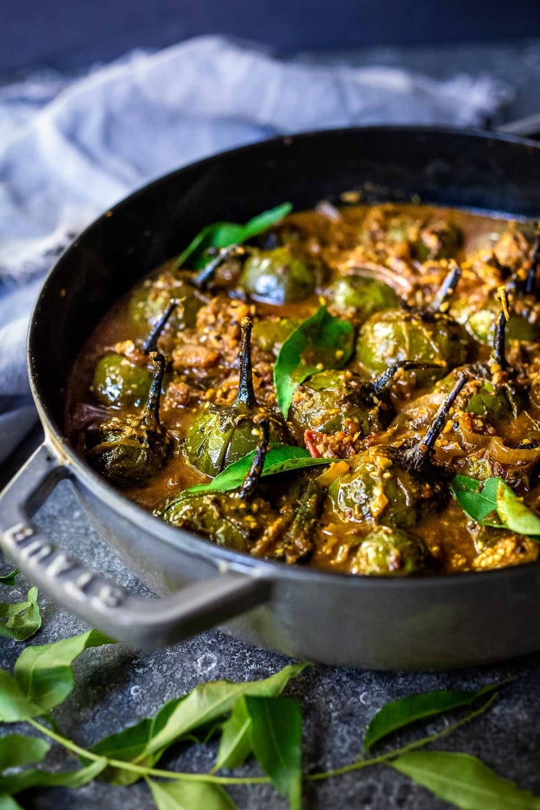 A flavorful recipe for Brinjal Curry (Indian Eggplant) gently simmered in a fragrant Masala Sauce. Serve with Indian-style Basmati Rice and naan bread for a delicious vegetarian or vegan meal. #brinjal #curryeggplant #indianeggplant #brinjalcurry