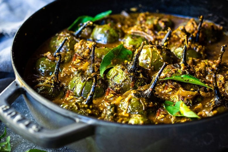 A flavorful recipe for Brinjal Curry (Indian Eggplant) gently simmered in a fragrant Masala Sauce. Serve with Indian-style Basmati Rice and naan bread for a delicious vegetarian or vegan meal. #brinjal #curryeggplant #indianeggplant #brinjalcurry 