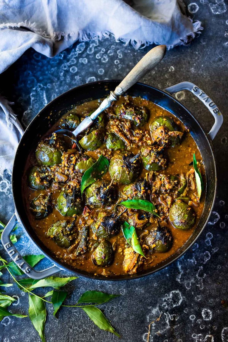 A flavorful recipe for Brinjal Curry (Indian Eggplant) gently simmered in a fragrant Masala Sauce. Serve with Indian-style Basmati Rice and naan bread for a delicious vegetarian or vegan meal. #brinjal #curryeggplant #indianeggplant #brinjalcurry