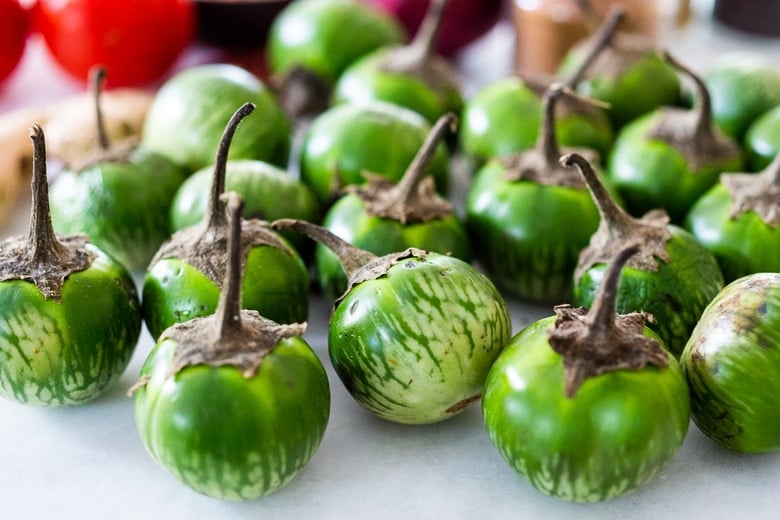 A flavorful recipe for Brinjal Curry (Indian Eggplant) gently simmered in a fragrant Masala Sauce. Serve with Indian-style Basmati Rice and naan bread for a delicious vegetarian or vegan meal. #brinjal #curryeggplant #indianeggplant #brinjalcurry 