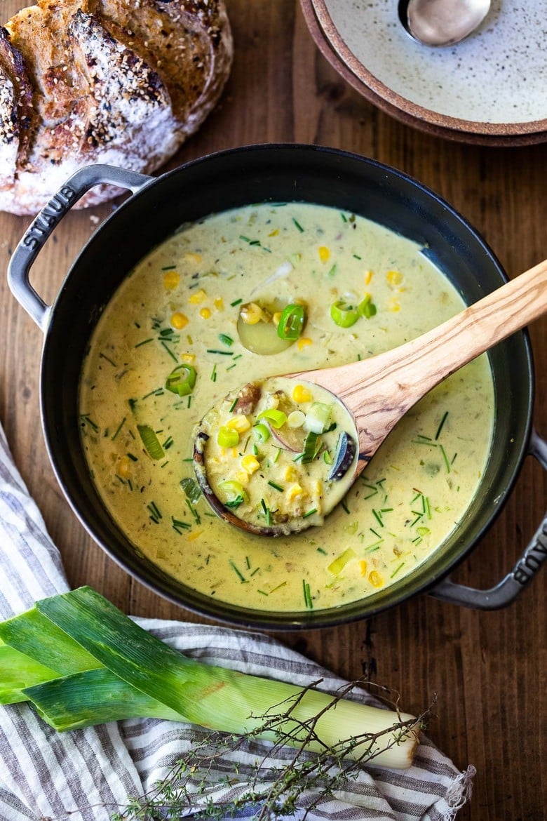 Cozy up with a bowl of this Coconut Corn Chowder with Leeks- a simple, comforting meal that can be made in under 30 minutes. Vegan and Gluten-free! #cornchowder #vegancornchowder #vegansoup