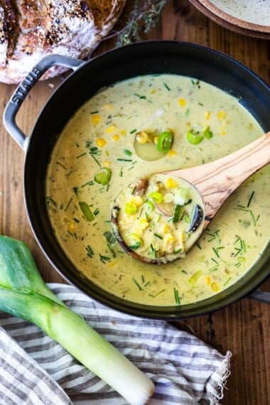 Cozy up with a bowl of this Coconut Corn Chowder with Leeks- a simple, comforting meal that can be made in under 30 minutes. Vegan and Gluten-free! #cornchowder #vegancornchowder #vegansoup