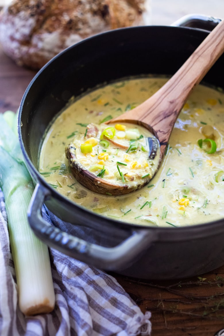 Cozy up with a bowl of this Coconut Corn Chowder with Leeks- a simple, comforting meal that can be made in under 30 minutes. Vegan and Gluten-free! #cornchowder #vegancornchowder #vegansoup
