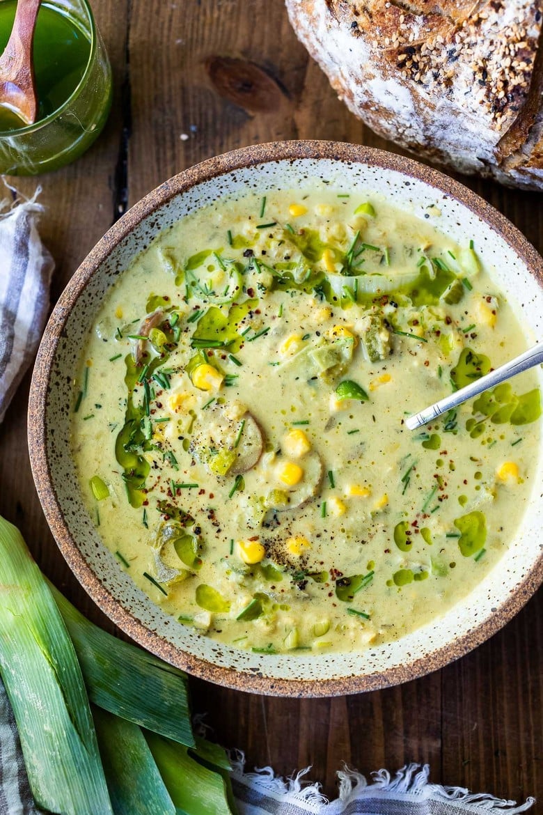 Cozy up with a bowl of this Coconut Corn Chowder with Leeks- a simple, comforting meal that can be made in under 30 minutes. Vegan and Gluten-free! #cornchowder #vegancornchowder #vegansoup