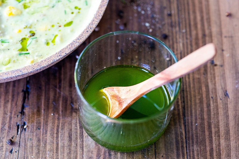 leek oil served over vegan corn chowder