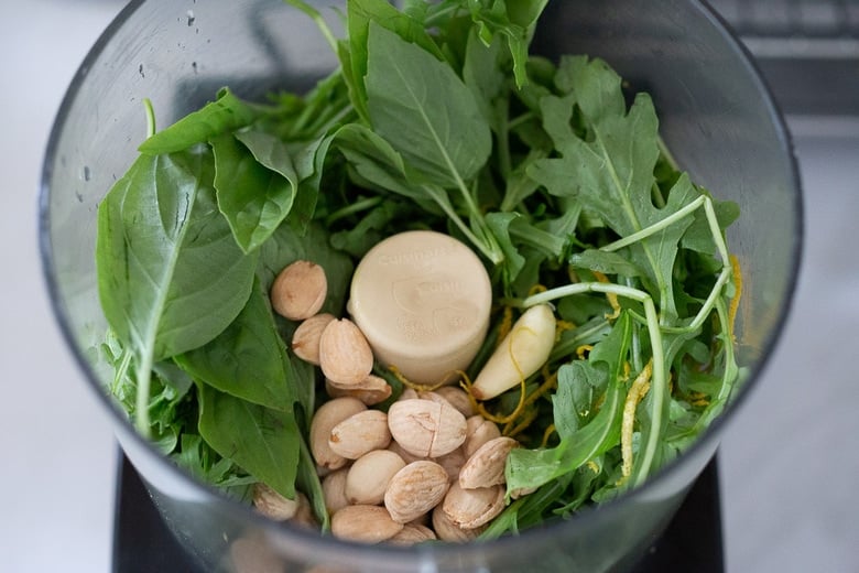 how to make arugula basil pesto- using a food processor. Vegan.