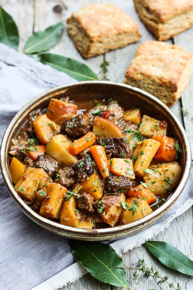 Get warm and cozy with this Instant Pot Beef Stew with Root Veggies- a hearty, comforting one-pot meal made in the pressure cooker, that is keto friendly, easy to make and full of depth and flavor. #beefstew #instantpotbeefstew #instantpot #bestbeefstew