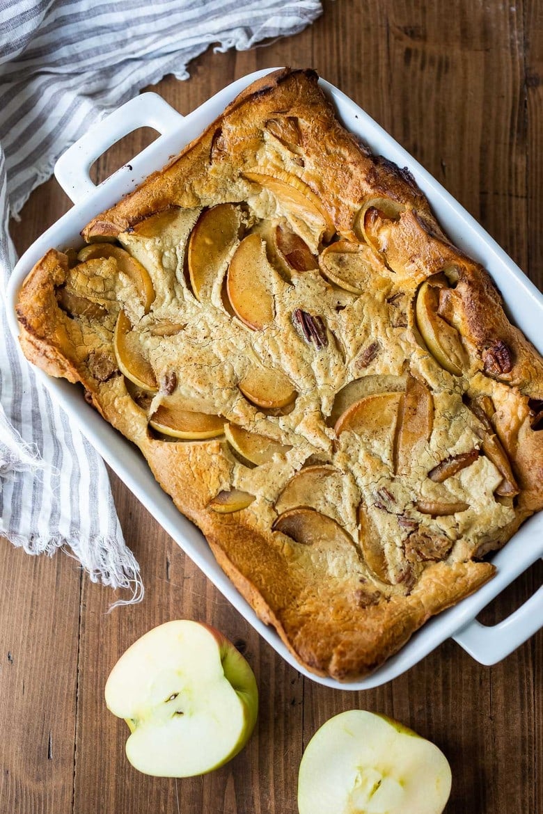 top view of baked apple pannekoeken recipe in casserole dish.