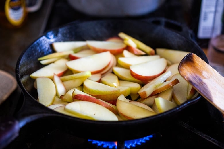 A simple recipe for Pannekoeken, a baked apple pancake hailing from the Netherlands, this version is infused with cardamom and nutmeg and puffs up dramatically in the oven. A delicious weekend breakfast or brunch. #applepancake