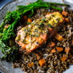 Roasted Salmon with Lemon and Thyme served over Braised French Green Lentils- a simple healthy weeknight dinner recipe! #lentils #salmon #bakedsalmon #frenchlemons