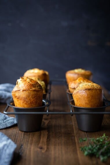 How to make the best Popovers from scratch that are light and airy on the inside and golden and crispy on the outside. An easy recipe that requires only 15 minutes of hands-on time! #popovers