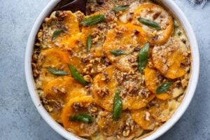  Butternut Squash Gratin with Leeks, Sage and Walnuts - a delicious meatless side dish, highlighting the best of fall ingredients, worthy of  the holiday table! Vegan-adaptable! #butternutsquash #gratin #sidedish #thanksgivingrecipes