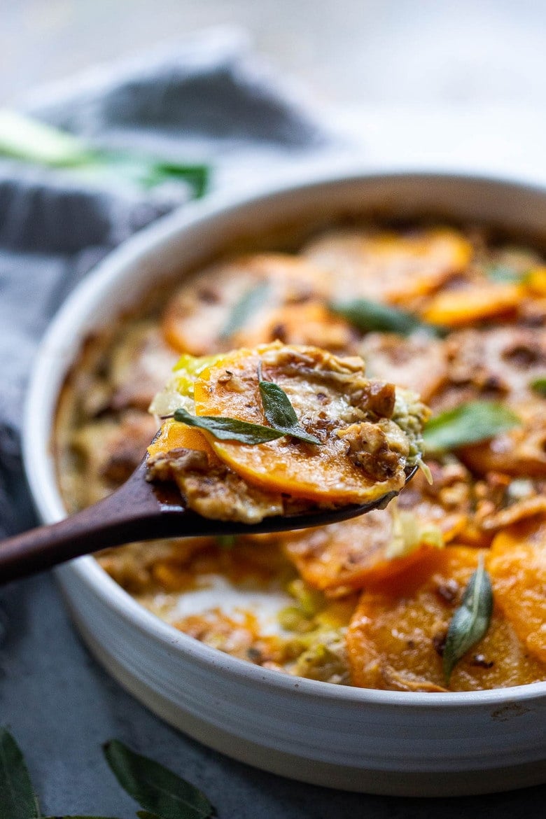  Butternut Squash Gratin with Leeks, Sage and Walnuts - a delicious meatless side dish, highlighting the best of fall ingredients, worthy of  the holiday table! Vegan-adaptable! #butternutsquash #gratin #sidedish #thanksgivingrecipes 