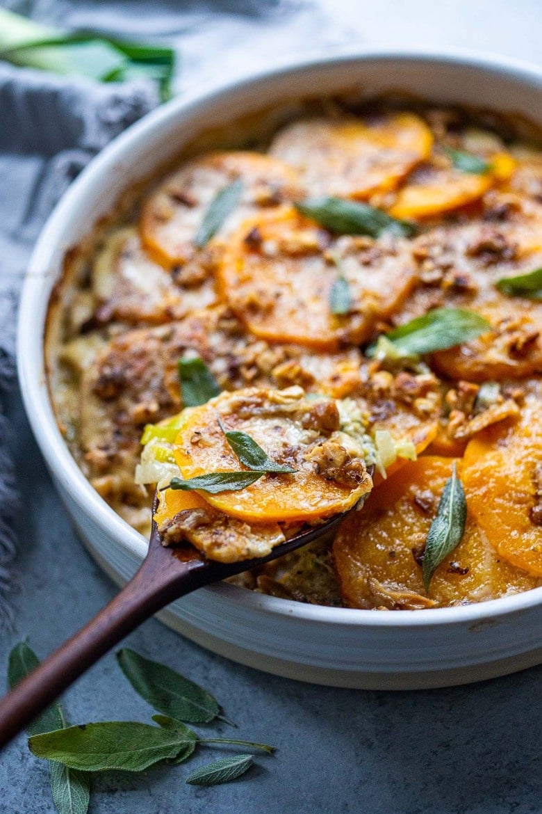  Butternut Squash Gratin with Leeks, Sage and Walnuts - a delicious vegetarian side dish, highlighting the best of fall ingredients, worthy of  the holiday table! Vegan-adaptable! #butternutsquash #gratin #sidedish #thanksgivingrecipes 