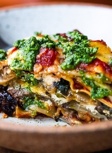 An EASY Eggplant Lasagna made with no-boil noodles and topped with Arugula Pesto. A delicious, healthy vegetarian dinner recipe that is comforting and nourishing.