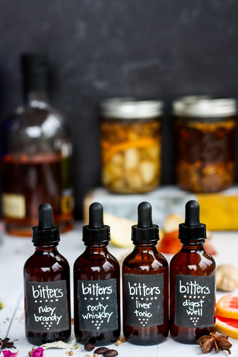 How to make Digestive bitters and Liver Tonic.  An important health tonic that can boost digestion, balance liver health and so much more.  Bitters add beautiful interest and depth to drinks and cocktails. A fun and easy project that takes very little hands-on time! Perfect for holiday gifts and stocking stuffers.