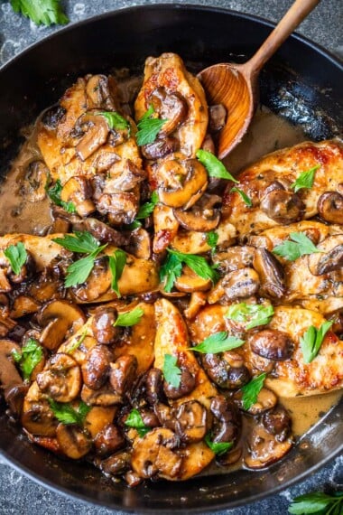 This flavorful, easy Chicken Marsala recipe is rich, earthy, and complex, with double the mushrooms in a creamy Marsala wine sauce. Serve Chicken Marsala over a bowl of creamy polenta with a leafy green salad, and dinner is ready. Includes a Video.