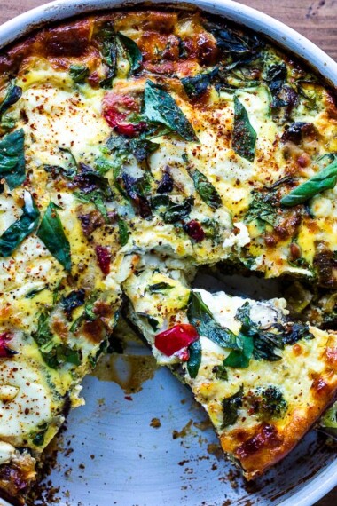 This delicious Baked  Frittata is easy to make, full of healthy vegetables, and very versatile. It can be made ahead - perfect for a holiday breakfast or brunch, or serve it up for lunch or dinner -an easy, clean-out-the fridge kind of meal. This crustless quiche is Keto, Gluten-free and low-carb. #frittata #healthybreakfast