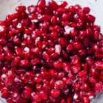 The EASIEST way to cut a pomegranate with a quick video tutorial. Once you try this method, for deseeding a pomegranate, you'll never go back! #pomegranate