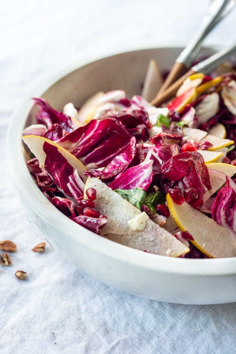 Here's a delicious Radicchio Salad with pears, walnuts, and shaved pecorino cheese in a tasty Champagne vinaigrette dressing. Make it ahead and toss before serving. 