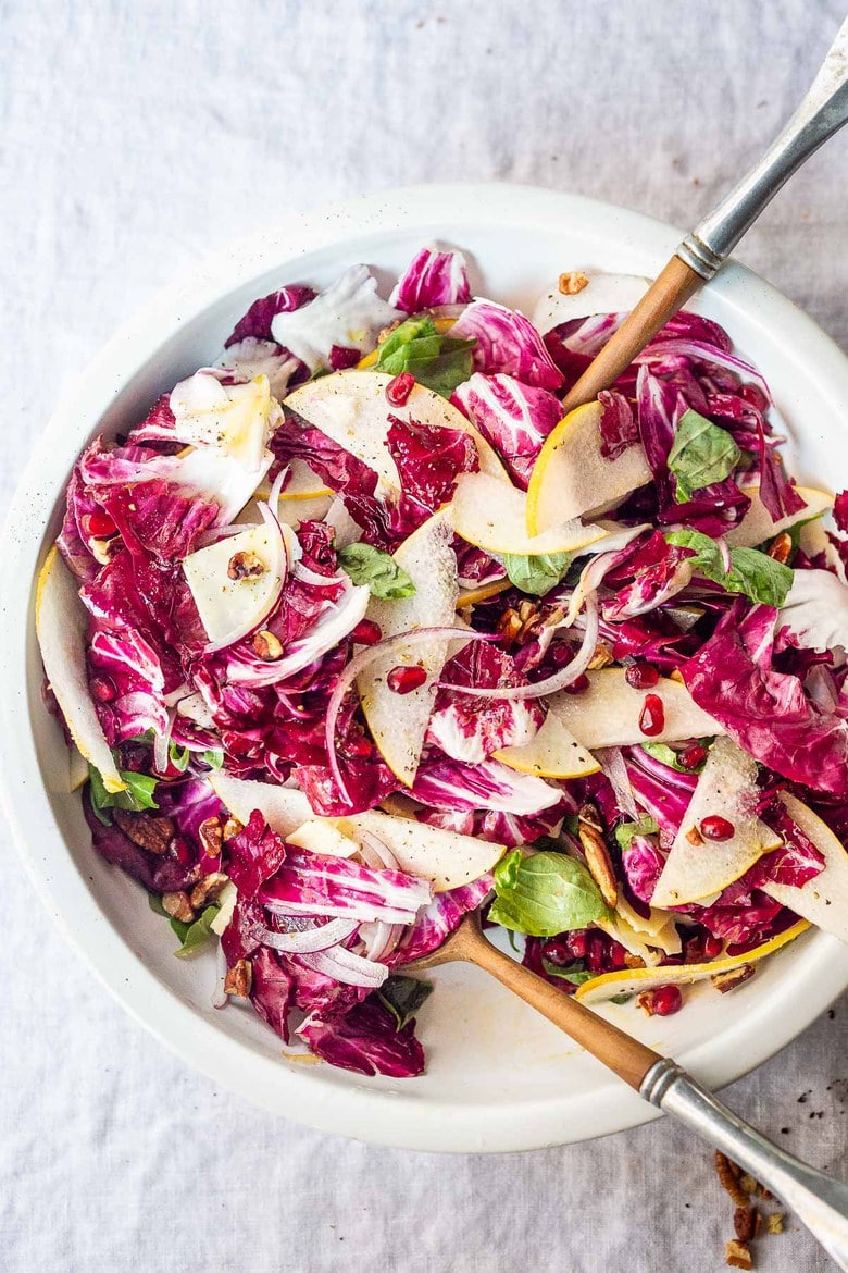 Here's a delicious Radicchio Salad with pears, walnuts, and shaved pecorino cheese in a tasty Champagne vinaigrette dressing. Make it ahead and toss before serving. 