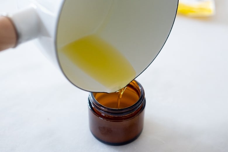 pour the shea body balm into jars 